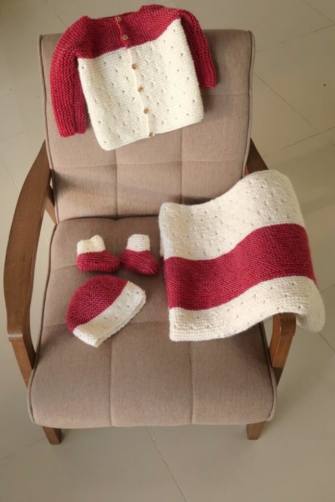 childrens knitting patterns baby sweater, blanket, booties and a hat
