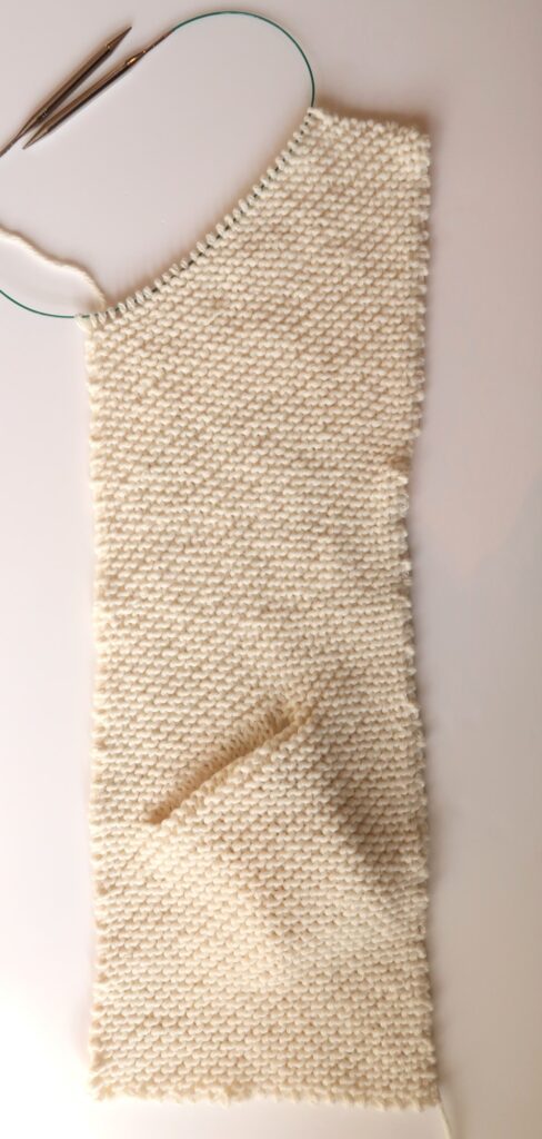 Decrease to shape the top of the chunky knit cardigan front panel