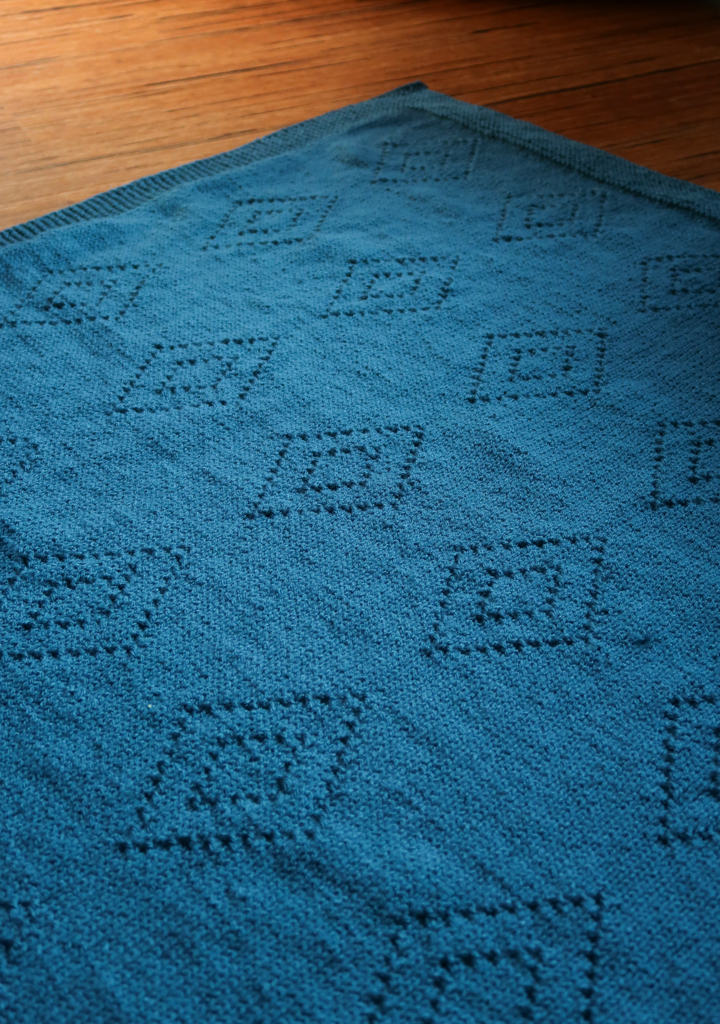 Diamond shaped texture in this easy blanket knitting pattern