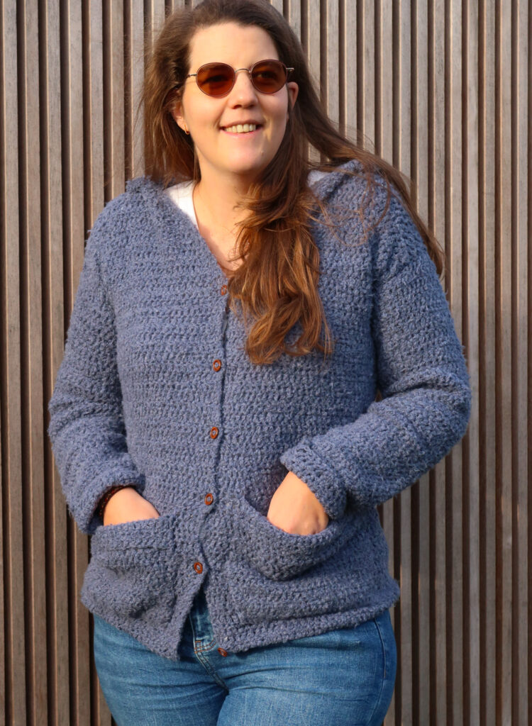 crochet hoodie pattern with hands in big comfy pockets