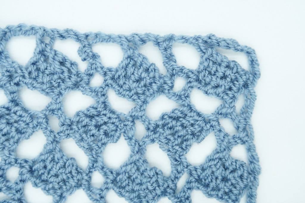 Completed swatch of lace squares crochet lace stitch