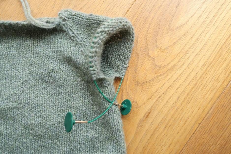 Keep stitches for baby sweater sleeves