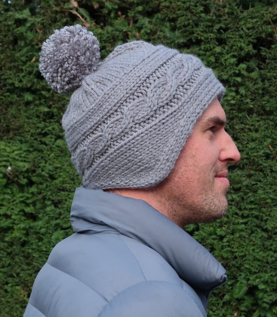 Find the cable knit beanie knitting pattern here >>