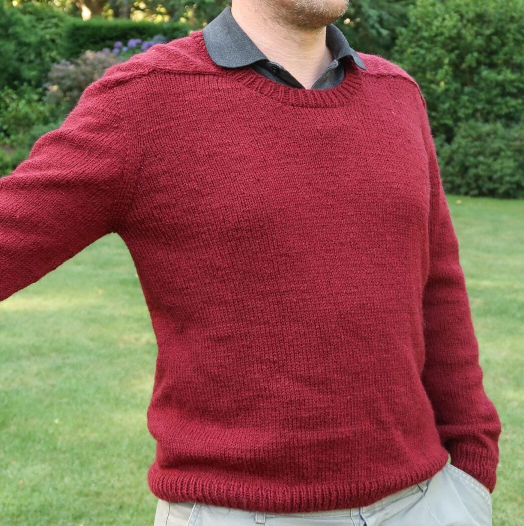 Side view showing the fit and drape of the DK weight sweater with standard positive ease