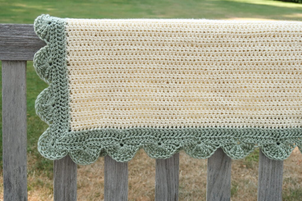 corner detail of the double crochet blanket pattern scalloped crochet edging