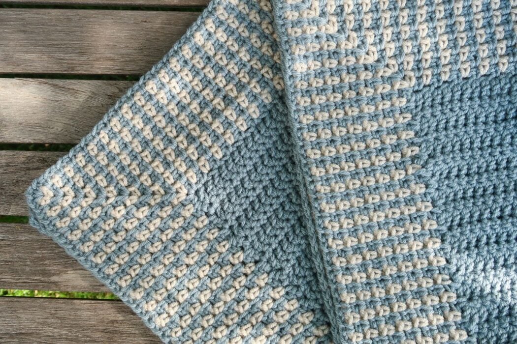 Tender Days Blanket folded into a square showing the crochet border pattern