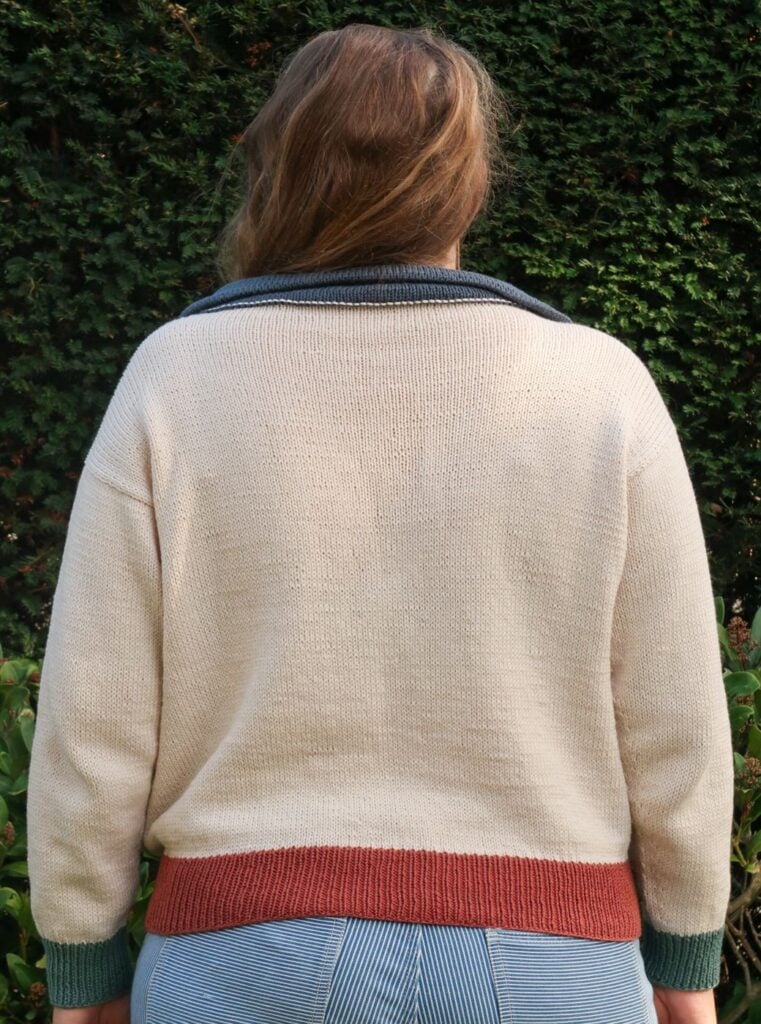 Back view of the Harbour Polo Sweater showing the dropped shoulders and folded collar